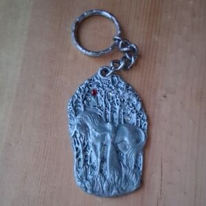 Silver Keychain with Forest Design